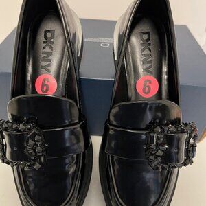 DKNY Ravish buckled round toe loafers.